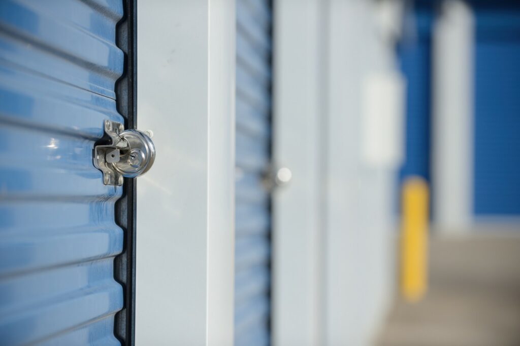 A view of a blue locked storage unit door