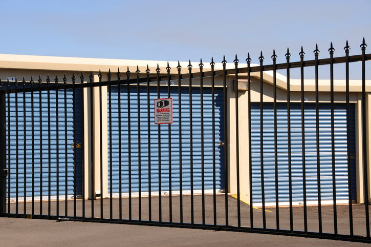 Secure storage units within a fenced storage facility.