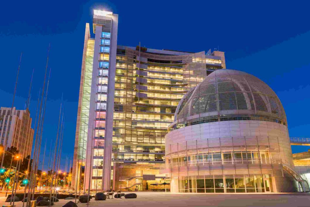 A photo of San Jose City Hall at night.