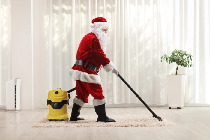 Santa using a vacuum